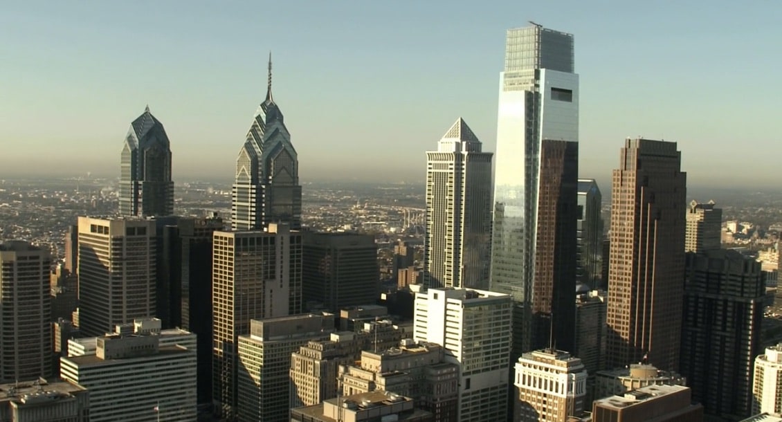 a view of a city with tall buildings.